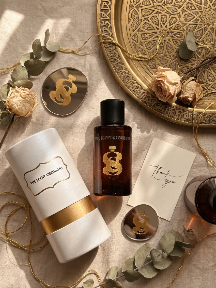 Perfume ritual with botanical details and gold presentation pieces
